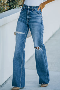 Hoch sitzende Distressed-Jeans mit ungesäumtem Saum