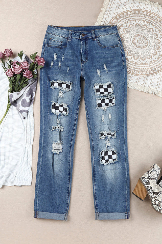 Jeans effetto consumato a vita media patchwork a quadri