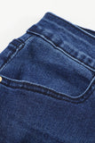 Jeans skinny effetto consumato a vita media