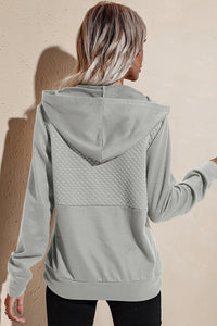 Gesteppter Sweatshirt-Hoodie mit Patchwork-Knöpfen